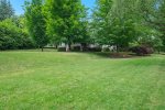 Large grass lawn in front of the house